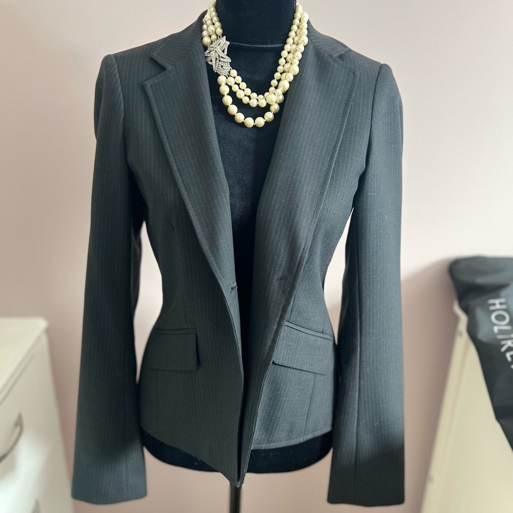 Blazer with peplum pleated details